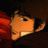 A pixelated contact sheet showing two frames of an animated icon featuring a character from Cowboy Bebop and text reading "Anime IM" with "com" below it on a black background.