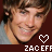 Animated contact sheet of 15 frames showing a person with brown hair and blue eyes in various poses, each frame containing text overlays and heart symbols on a dark red background.