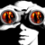 Pixelated white figure with large orange eyes and a wide mouth against black background