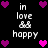 Pixelated icon with black background, white text "in love && happy", and pink/purple heart symbols in corners and center.