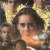 A pixelated static image shows a central figure with dark hair and a light-colored garment, flanked by two smaller figures against a warm-toned background with yellow and brown hues.