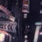 Pixelated static image of a figure in motion against dark background with light-colored limbs and torso, partially obscured by pixelation.