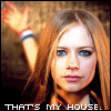 A split-screen image shows a person with long light brown hair on the left and a crumpled white object on the right, with text at the bottom reading "THAT'S MY HOUSE."