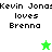 Pixelated text reads "Kevin Jonas loves Brenna" on split background with white and green sections, featuring a green star and white star icon.