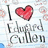 A pixelated image with a heart symbol replacing the 'O' in 'I Love Edward Cullen' text on a lined paper background.