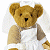 A pixelated teddy bear in a white dress with angel wings and halo on the left, next to green text reading "Original Icons .com" on a dark green background.