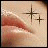 Animated sequence showing lips with two star-shaped sparkles changing from dark brown to white.