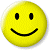 A 50x50 pixel animated buddy icon split into two frames showing a yellow smiley face on the left and green text "Original Icons .com" on a dark background on the right, with no visible animation changes between frames.