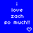 Blue background with white pixelated text reading 'i love zach so much!!' and two heart symbols below the text.