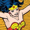 Wonder Woman in a red and yellow costume with a yellow headband featuring a red star, blue hair, and red earrings, arms raised against a striped background.