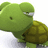 Green pixelated turtle with closed eyes and a small smile on left, pink background with purple text 'orli' on right.