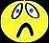 Yellow circular face with wide eyes and downturned mouth on dark background.