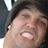 A pixelated image shows a person with a dark beanie and white shirt against a black background, with red text reading "Minee" and "Ladies.. and Men =] BACK OFF!!!!".
