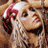 A 4-frame contact sheet of a pixelated animated icon featuring Christina Aguilera with pink hair accessory, a dancing figure silhouette, and handwritten text "Christina Aguilera" and "stripped" across frames.