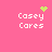 Pixelated pink background with white text 'Casey Cares' and green pixel art symbols above each instance.