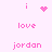 Pixelated pink text and symbols on a light pink background with animated dot patterns and heart shapes.