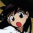 A pixelated anime-style character with wide eyes and open mouth on the left, next to stylized text reading "Anime IM" above a smaller "com" on a black background.