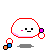 A white rounded character with red outline and pink cheeks performs various actions while holding or interacting with small colored cubes.