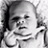 Black-and-white pixelated image of a person with hand near face on left, green text 'OriginalIcons.com' on right.