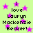 A static image with a light green background filled with pink stars and repeated text reading "i love Lauryn Mackenzie Becker!" in black pixelated font.