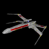A silver and red starfighter with yellow accents rotates through multiple angles against a black background.
