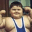 Pixelated image of a smiling person in a blue tank top flexing muscles, with green text reading "IT'S A FAT KID" on blue and gray backgrounds.