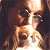 A pixelated contact sheet showing two frames of an animated icon featuring a person with long hair and sunglasses on the left, next to green text reading "Original Icons .com" on a dark background.