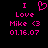 Pixelated pink text and heart symbol on black background with date stamp.