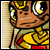 A cartoon character with large yellow eyes and a brown face wears a yellow outfit with red accents, standing against a beige background.