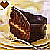 Pixelated static icon featuring a brown heart symbol and a dark brown object resembling a chocolate cake slice on a yellowish background with light purple accents.