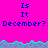 A static image with a bright pink background displays repeated text "Is It December?" in blue pixelated font across two , separated by a wavy cyan and purple pattern
