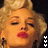 Animated contact sheet of a woman with blonde hair in an updo, red lipstick, and earrings across eight frames showing subtle facial expression changes.