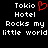 Black background with white pixelated text reading "Tokio Hotel Rocks my little world" and a red heart symbol replacing the 'o' in Tokio.