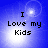 Blue background with white light burst and circular halo; black pixelated text "I Love my Kids" centered across four quadrants.