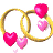 Animated sequence of interlocking golden rings with pink hearts and small heart fragments floating around them on a white background.