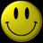 A yellow smiley face icon with cyan text reading 'lights... camera... action...' and 'SMILE... CHEESE!!!' on a black background.