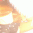 Pixelated image with four text sections and a blurred orange-yellow graphic element on the left.