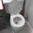A pixelated image shows a toilet bowl on the left and bold white text reading "She Fell In!!!" on a black background to the right.