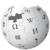 Pixelated grayscale sphere with scattered dark patches and a prominent cross-shaped mark on its upper-left surface.