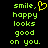 Green pixelated text on black background reads "smile, happy looks good on you." with a yellow heart symbol replacing the comma after smile.