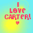 Pixelated text "I LOVE CARTER!" in red with a small heart below, set against a blue and yellow gradient background.