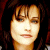 A pixelated image of a person with dark hair and bangs on the left, next to green text reading 'Original Icons .com' on a solid green background.