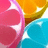A static image of sliced citrus fruits with pink, orange, and blue segments arranged in a pattern