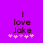 Purple background with dark brown text reading 'I love Jake' and a of pink and purple pixelated hearts below