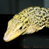 Animated contact sheet showing a yellow spotted fish-like creature in two frames with a blue background containing "COOLBUDDY.COM" text on the right frame.