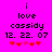 Pixelated text on bright pink background with red and pink hearts, showing two animation frames where heart colors shift.