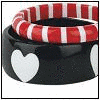 A black glossy circular base with a white heart on the left side, topped by a red and white striped ring that shifts position across frames.