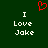 Green background with white text reading "I Love Jake" on both sides and a red pixelated heart above center.
