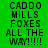 Green background with black text reading "CADDO MILLS FOXES ALL THE WAY!!!!!" in pixelated font, displayed across three with white horizontal bars shifting position