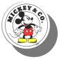 Circular icon featuring Mickey Mouse in red shorts, yellow shoes, and black gloves, with "MICKEY & CO." text around the edge, shown in multiple views including front, side, and angled perspectives.